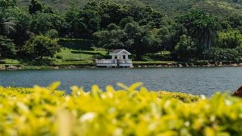 Gazebos constructed on raised decks can be found along the shoreline of the lake.